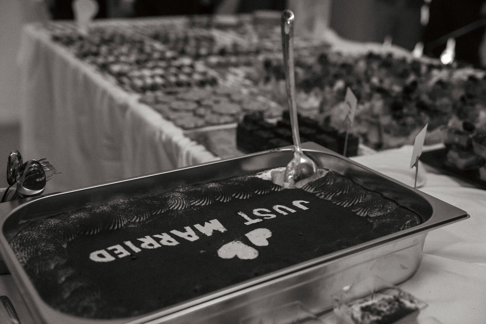 A catering tray reading Just Married with heart decorations
